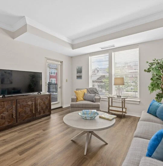 interior view of open concept living room of a senior living residence