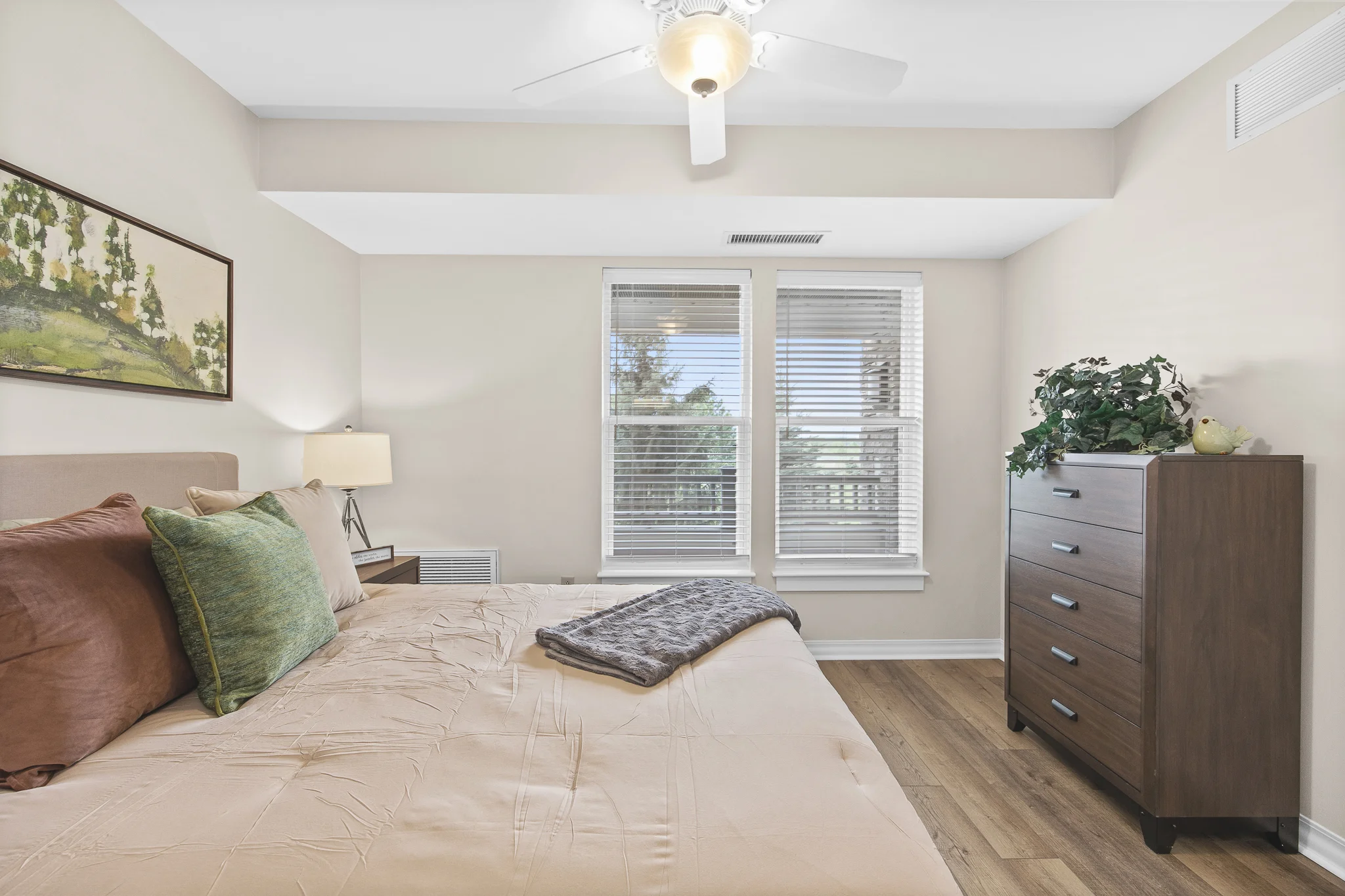 fully furnished bedroom of a senior living apartment