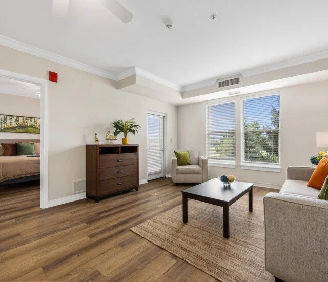 fully furnished living room area of senior apartment