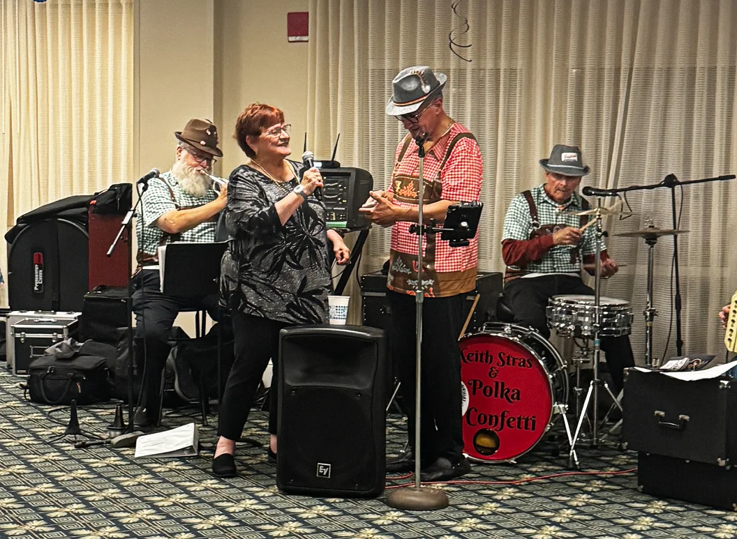senior musicians perform in a band for their retirement community